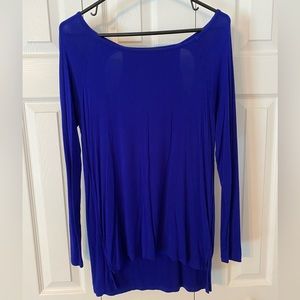Royal blue long sleeved cable and gauge shirt with keyhole cutouts on the back